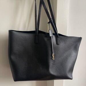 Saint Laurent Black Leather Bag with Gold YSL Charm